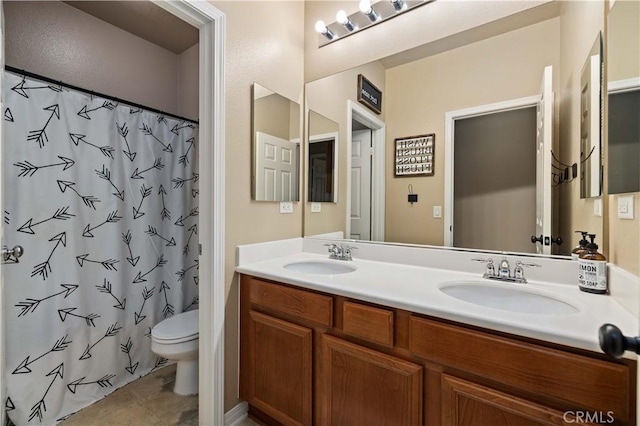 5058 Meadowsweet Dr, Palmdale, CA 93551 - bathroom featuring toilet, double vanity, tile patterned flooring, and a shower with curtain