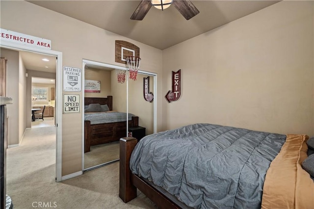 5058 Meadowsweet Dr, Palmdale, CA 93551 - bedroom with light colored carpet, a closet, and ceiling fan