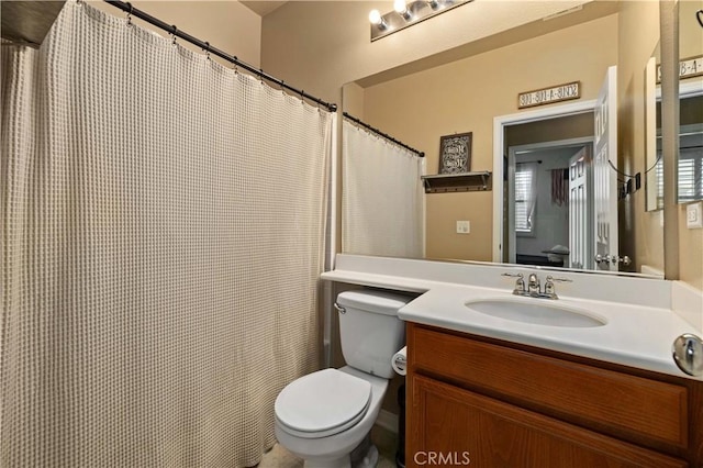 5058 Meadowsweet Dr, Palmdale, CA 93551 - bathroom featuring toilet, vanity, and curtained shower