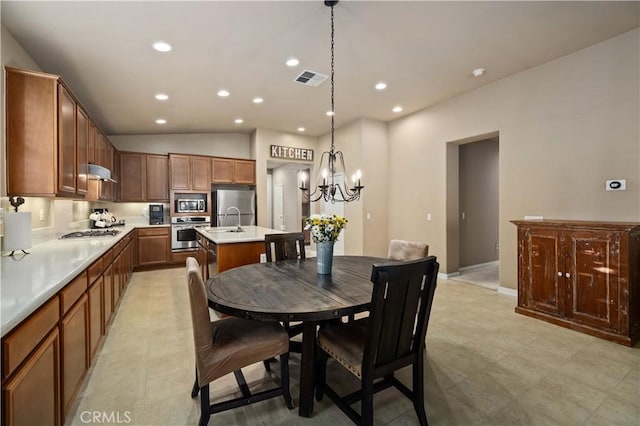 5058 Meadowsweet Dr, Palmdale, CA 93551 - dining space with a chandelier, recessed lighting, and lofted ceiling
