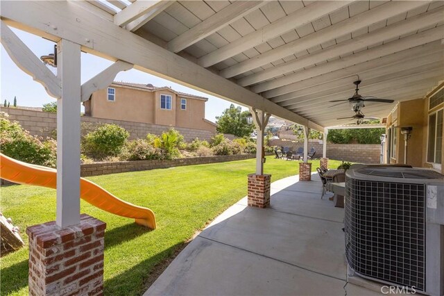 5058 Meadowsweet Dr, Palmdale, CA 93551 - view of patio / terrace with central AC unit, a playground, a ceiling fan, and outdoor dining area