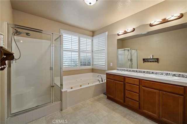 5058 Meadowsweet Dr, Palmdale, CA 93551 - full bathroom featuring a stall shower, a jetted tub, and double vanity