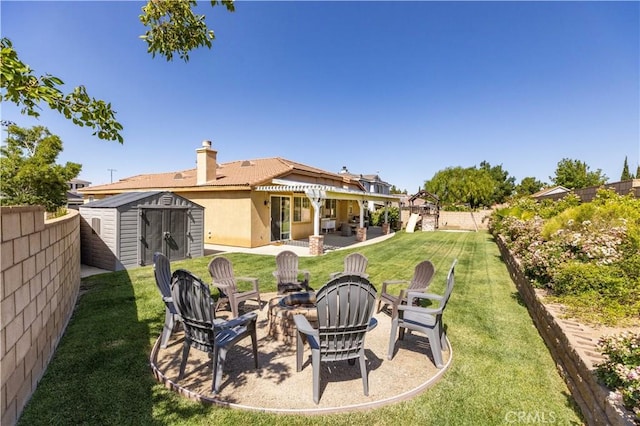5058 Meadowsweet Dr, Palmdale, CA 93551 - view of yard featuring a fire pit and a patio area