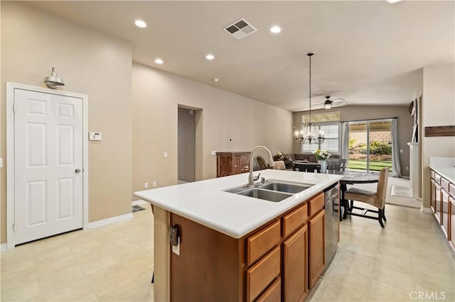 5058 Meadowsweet Dr, Palmdale, CA 93551 - kitchen with a sink, stainless steel dishwasher, brown cabinetry, a chandelier, and a kitchen island with sink