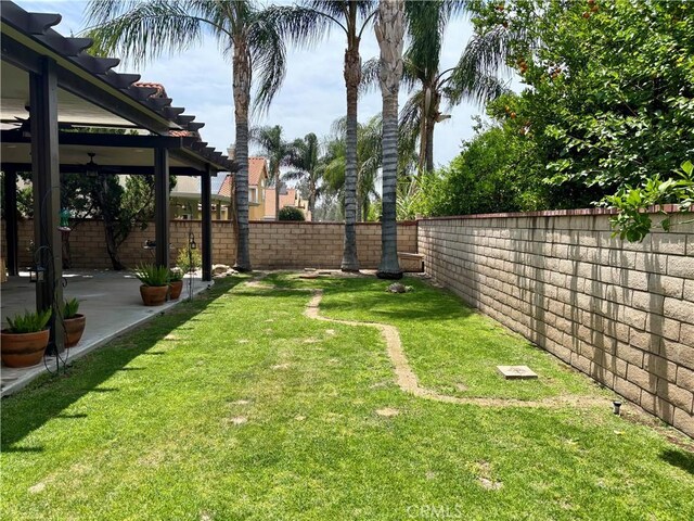 7440 Apple Blossom Ct, Highland, CA 92346 - view of yard featuring a patio area and a pergola
