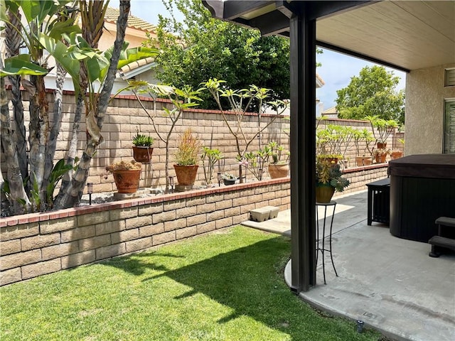 7440 Apple Blossom Ct, Highland, CA 92346 - fenced backyard with a hot tub and a patio area