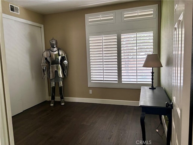 7440 Apple Blossom Ct, Highland, CA 92346 - unfurnished office featuring dark wood-style flooring and baseboards