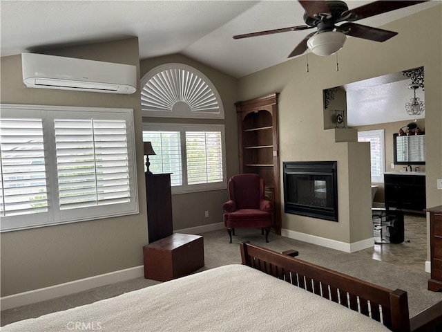7440 Apple Blossom Ct, Highland, CA 92346 - bedroom featuring a wall mounted air conditioner, a multi sided fireplace, lofted ceiling, carpet floors, and baseboards