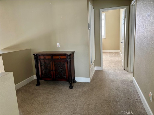 7440 Apple Blossom Ct, Highland, CA 92346 - corridor featuring carpet floors and baseboards