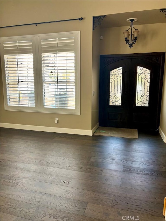 7440 Apple Blossom Ct, Highland, CA 92346 - entryway with a chandelier, baseboards, and wood finished floors