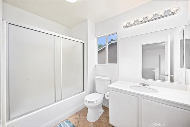 15863 Falcon Ct, Fontana, CA 92337 - bathroom featuring vanity, toilet, bath / shower combo with glass door, and tile patterned flooring