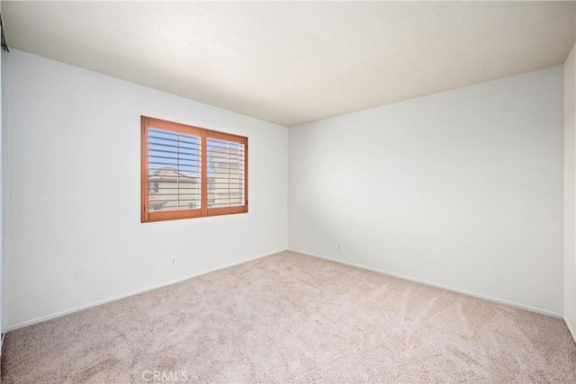 15863 Falcon Ct, Fontana, CA 92337 - carpeted spare room featuring baseboards