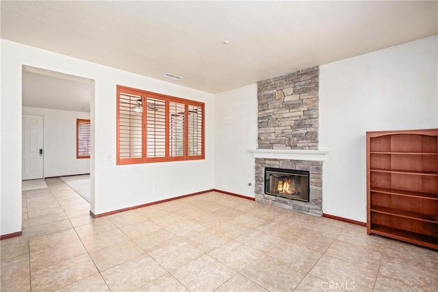 15863 Falcon Ct, Fontana, CA 92337 - unfurnished living room featuring tile patterned flooring, a fireplace, and baseboards