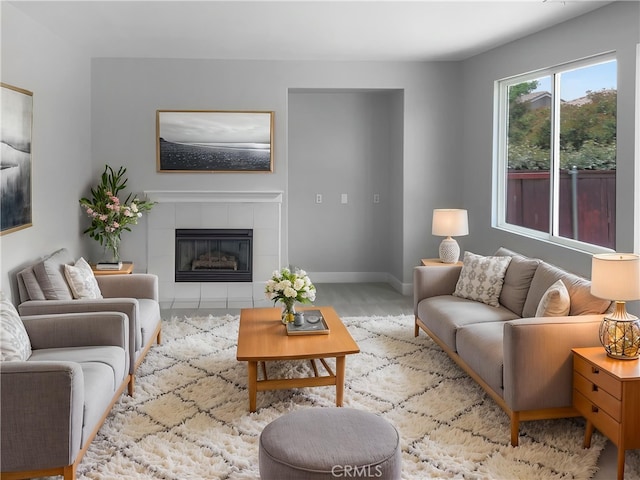 1281 Smoke Tree Ln, Beaumont, CA 92223 - living room with a fireplace and baseboards
