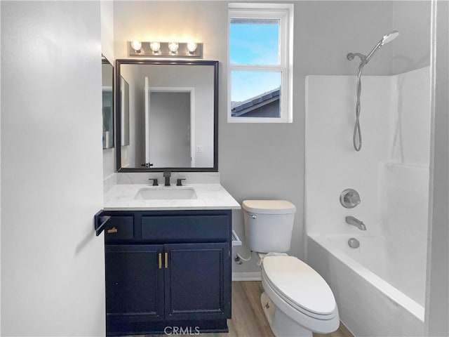 1281 Smoke Tree Ln, Beaumont, CA 92223 - bathroom with toilet, vanity, shower / bath combination, wood finished floors, and baseboards