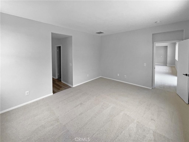 1281 Smoke Tree Ln, Beaumont, CA 92223 - empty room with carpet floors and baseboards
