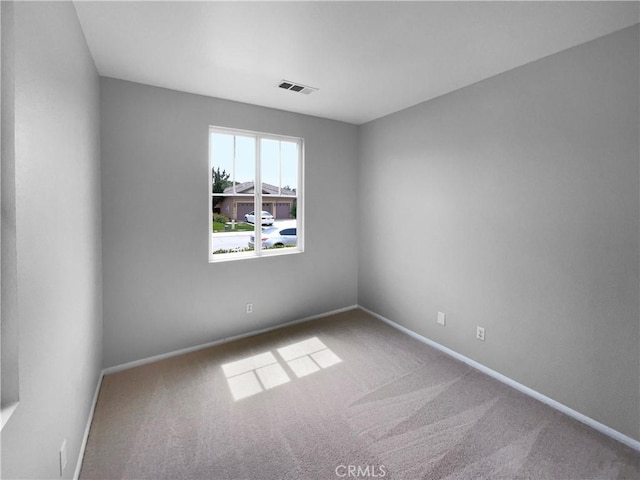 1281 Smoke Tree Ln, Beaumont, CA 92223 - carpeted empty room with baseboards
