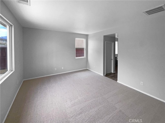 1281 Smoke Tree Ln, Beaumont, CA 92223 - carpeted spare room with baseboards