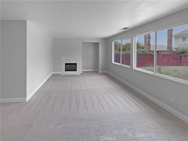 1281 Smoke Tree Ln, Beaumont, CA 92223 - unfurnished living room with carpet floors, baseboards, and a fireplace