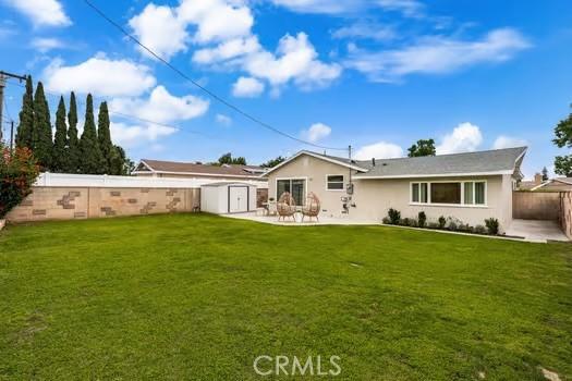 10946 Kentucky Ave, Whittier, CA 90603 - rear view of house with a patio area and stucco siding