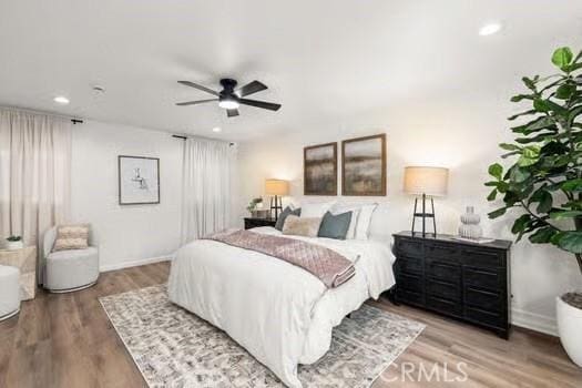 10946 Kentucky Ave, Whittier, CA 90603 - bedroom with wood finished floors, recessed lighting, baseboards, and ceiling fan