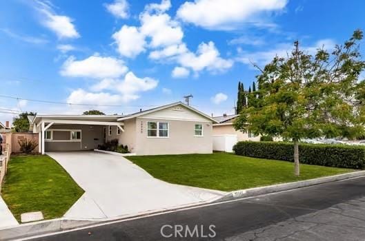 10946 Kentucky Ave, Whittier, CA 90603 - single story home with driveway, a carport, and stucco siding