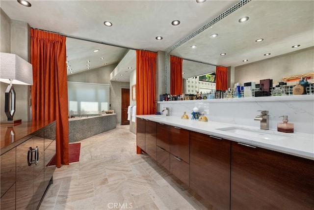 7626 E Saddlehill Trl, Orange, CA 92869 - full bathroom with recessed lighting, double vanity, a bath, and vaulted ceiling