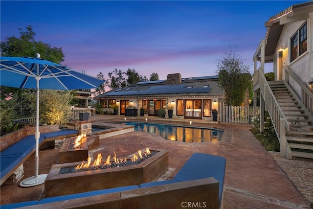 7626 E Saddlehill Trl, Orange, CA 92869 - outdoor pool with a fire pit, stairway, and a patio area