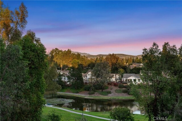 7626 E Saddlehill Trl, Orange, CA 92869 - view of property's community with a water and mountain view and a yard