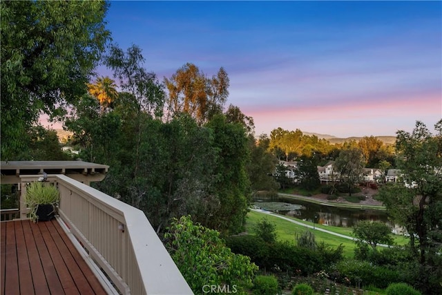 7626 E Saddlehill Trl, Orange, CA 92869 - wooden deck with a water view and a yard