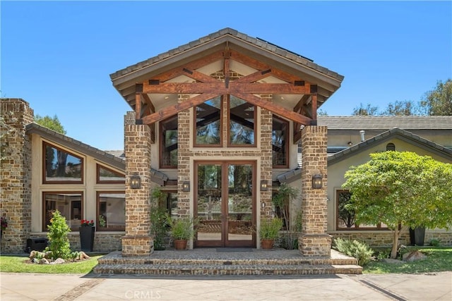 7626 E Saddlehill Trl, Orange, CA 92869 - entrance to property with french doors and stone siding
