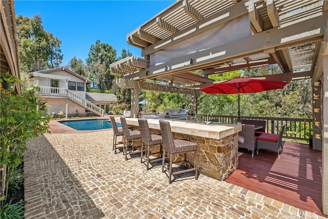 7626 E Saddlehill Trl, Orange, CA 92869 - view of patio with a pergola, an outdoor pool, grilling area, and a deck