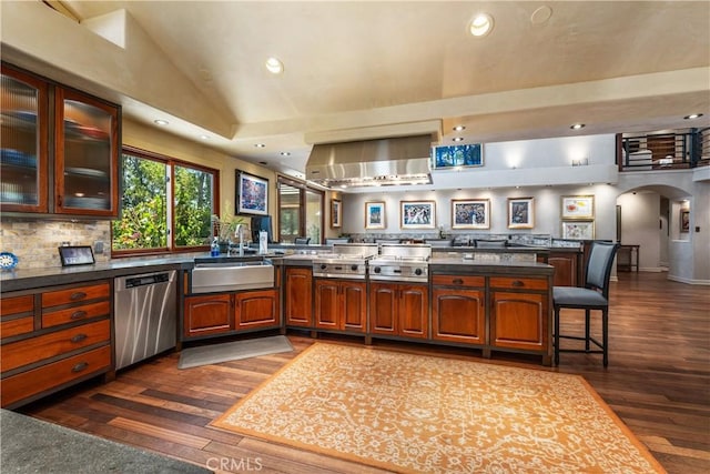 7626 E Saddlehill Trl, Orange, CA 92869 - kitchen featuring stainless steel dishwasher, a sink, arched walkways, recessed lighting, and dark wood-style floors