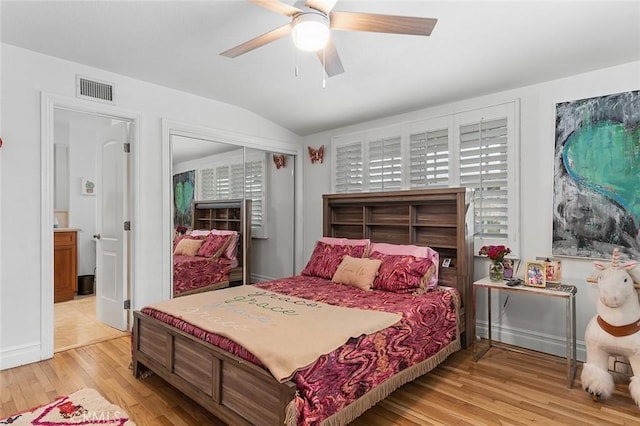 6324 E Colorado St, Long Beach, CA 90803 - bedroom with vaulted ceiling, light wood-style flooring, a ceiling fan, a closet, and multiple windows