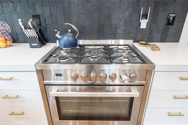 6324 E Colorado St, Long Beach, CA 90803 - kitchen view of stainless steel gas stove, decorative backsplash, and light countertops
