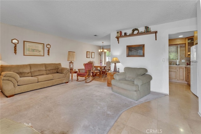 1115 Conlon Ave, La Puente, CA 91744 - living room featuring healthy amount of natural light, a chandelier, a textured ceiling, light tile patterned floors, and light colored carpet