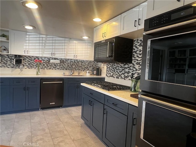 1767 W Chandeleur Dr, San Pedro, CA 90732 - kitchen with black appliances, light countertops, tasteful backsplash, white cabinetry, and recessed lighting