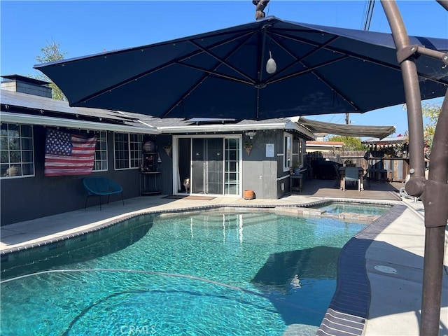 1767 W Chandeleur Dr, San Pedro, CA 90732 - view of swimming pool featuring a pool with connected hot tub and a patio area