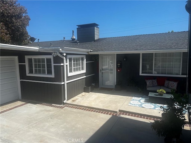 1767 W Chandeleur Dr, San Pedro, CA 90732 - rear view of property with an outdoor living space, a patio, a chimney, and roof with shingles