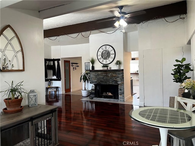 1767 W Chandeleur Dr, San Pedro, CA 90732 - living room with hardwood / wood-style floors, ceiling fan, beam ceiling, a fireplace, and baseboards