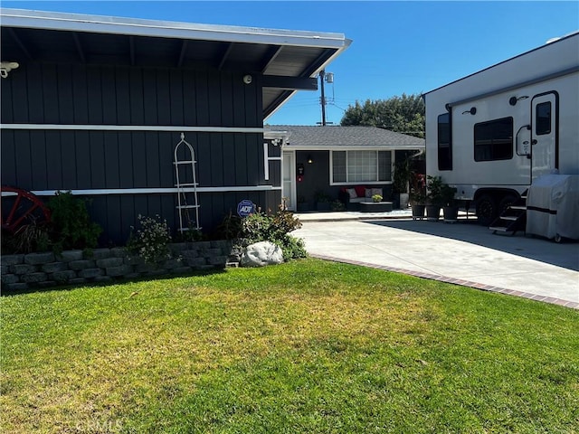 1767 W Chandeleur Dr, San Pedro, CA 90732 - view of side of home featuring a yard