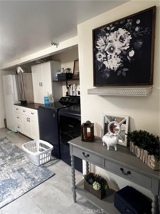 1767 W Chandeleur Dr, San Pedro, CA 90732 - kitchen featuring washer and clothes dryer, white cabinets, dark countertops, and open shelves