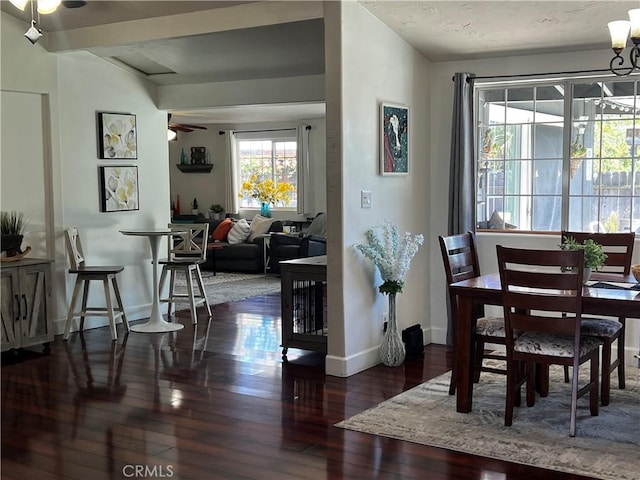 1767 W Chandeleur Dr, San Pedro, CA 90732 - dining area featuring wood-type flooring, ceiling fan, baseboards, and a chandelier