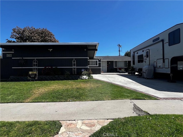 1767 W Chandeleur Dr, San Pedro, CA 90732 - view of front of property with a front lawn