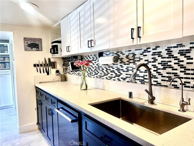 1767 W Chandeleur Dr, San Pedro, CA 90732 - kitchen featuring decorative backsplash, white cabinetry, light stone countertops, blue cabinetry, and dishwasher