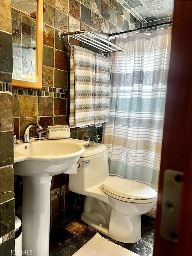 1767 W Chandeleur Dr, San Pedro, CA 90732 - full bathroom with tile walls and a shower with shower curtain