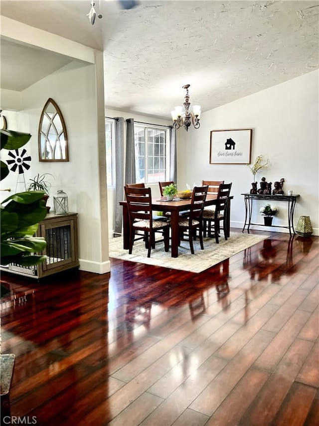 1767 W Chandeleur Dr, San Pedro, CA 90732 - dining area featuring wood finished floors and a chandelier