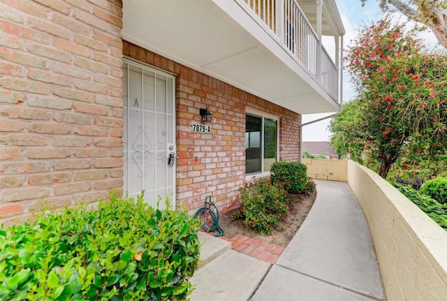 7879 Rancho Fanita Unit A, Santee, CA 92071 - property entrance with brick siding and a balcony