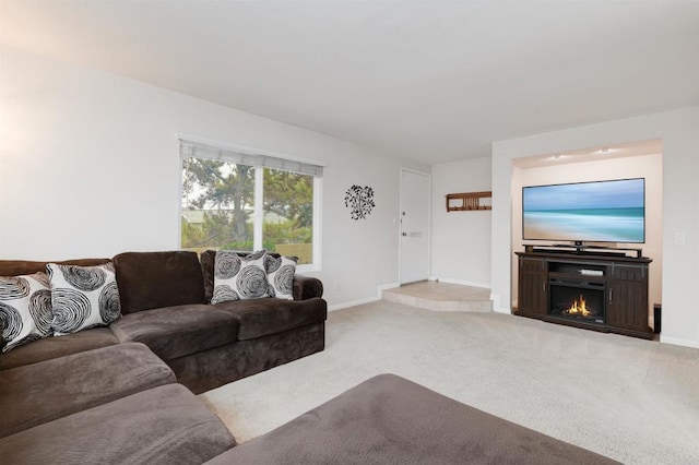 7879 Rancho Fanita Unit A, Santee, CA 92071 - living area with carpet flooring, baseboards, and a lit fireplace