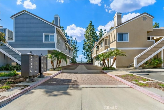 56 Coventry Ln Unit 293, Aliso Viejo, CA 92656 - view of concrete road with stairs and curbs
